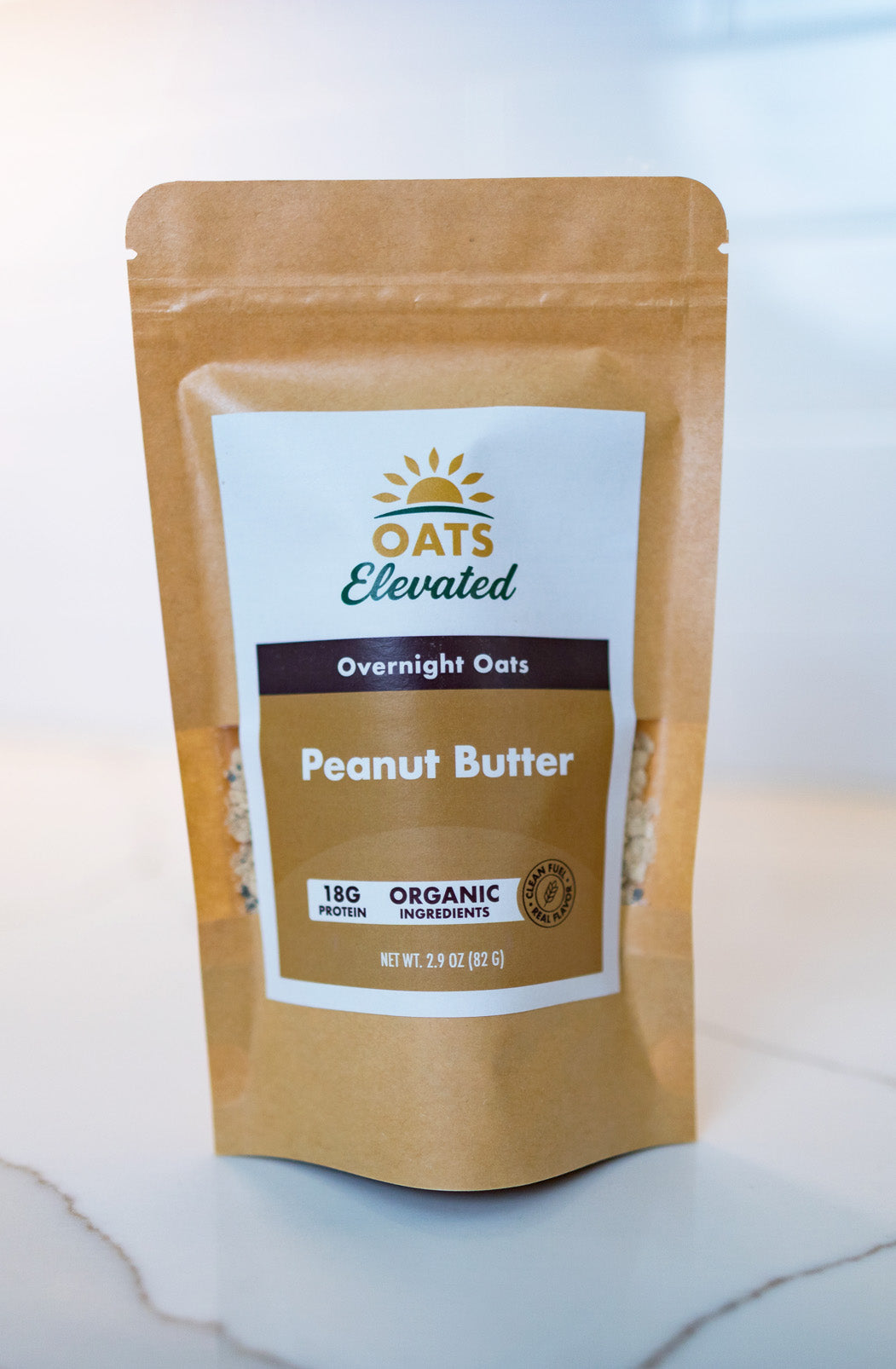 Front of package of Oats Elevated Peanut Butter Overnight Oats with organic ingredients, high-protein breakfast.