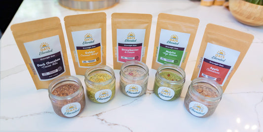 Five Oats Elevated pouches behind five jars of prepared overnight oats on a kitchen counter
