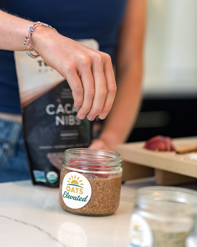 Brooke Sweeney demonstrating how to prepare overnight oats – step 3, stir and adjust as needed, then top with your favorite nuts, fruits, or granola, and enjoy! 