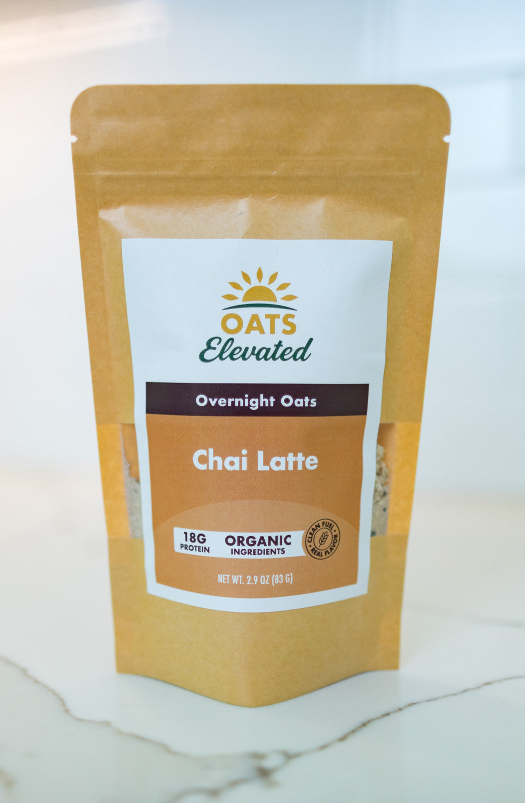 Front of package of Oats Elevated Chai Latte Overnight Oats with organic ingredients, high-protein breakfast.