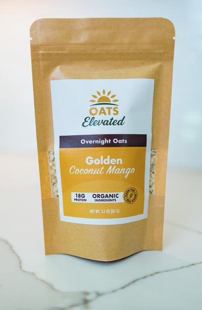 Front of package of Oats Elevated Golden Coconut Mango Overnight Oats with organic ingredients, high-protein breakfast.