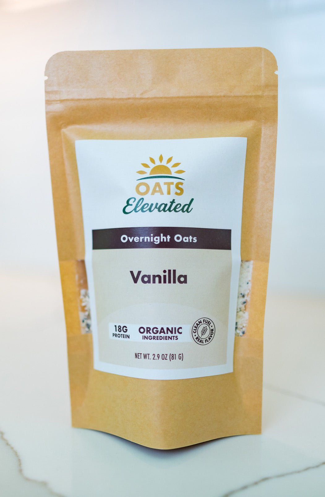 Front of package of Oats Elevated Vanilla Overnight Oats with organic ingredients, high-protein breakfast.